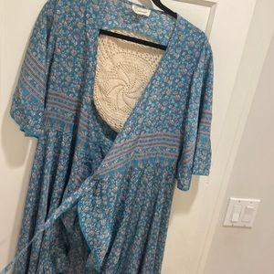 Blue beautiful dress with detail on the back